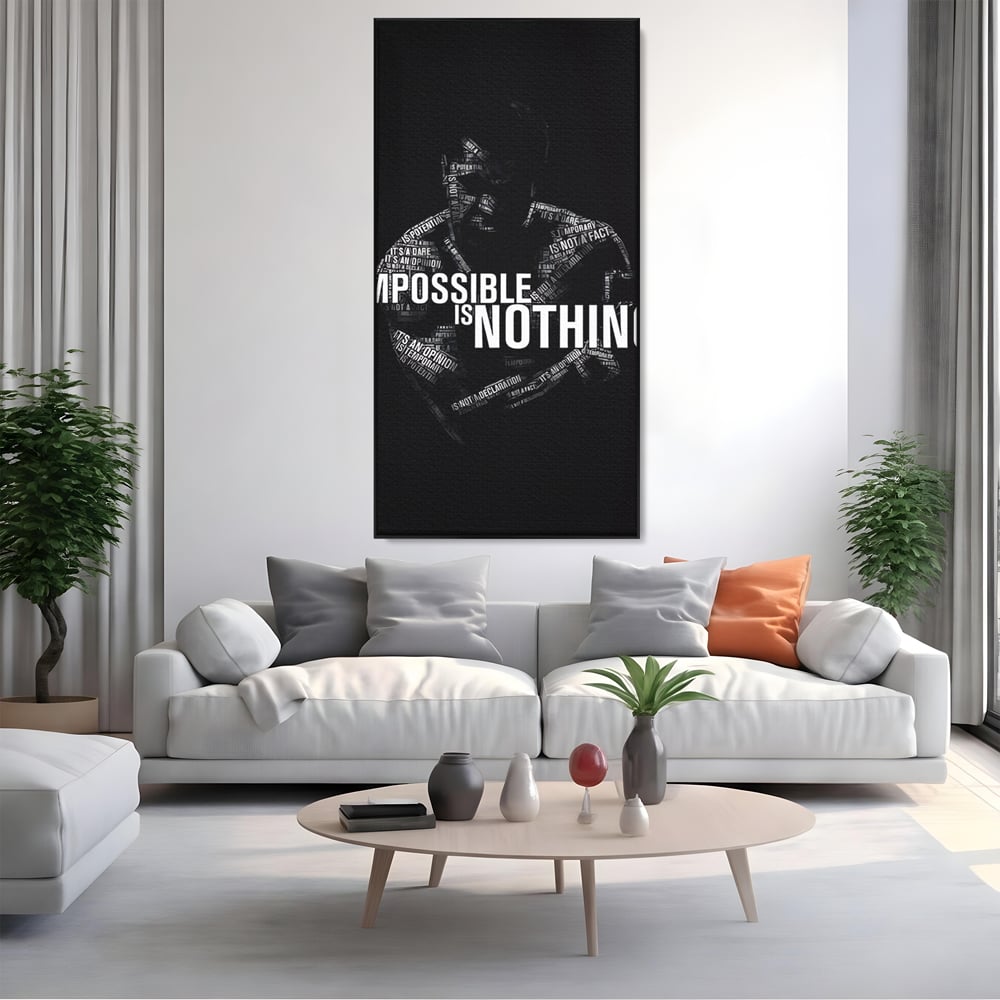 Tablou canvas cu tablou canvas cu silueta masculina si text motivational, in rama de aluminiu negru, pe perete intr-un living